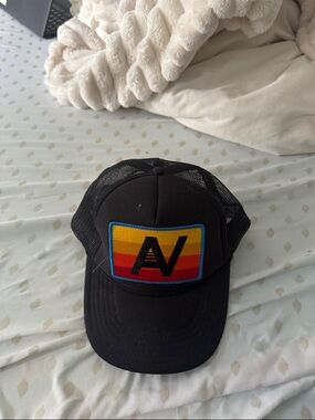 Black Trucker Hat with Colorful Sunset Patch